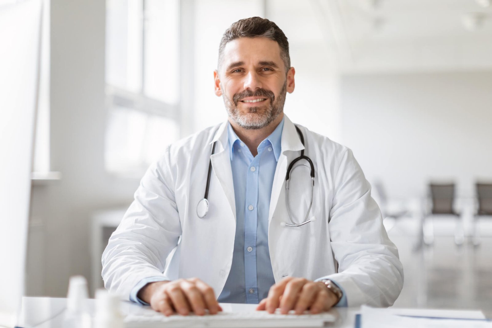 portrait of happy middle aged male doctor having h mp8au7v.jpg